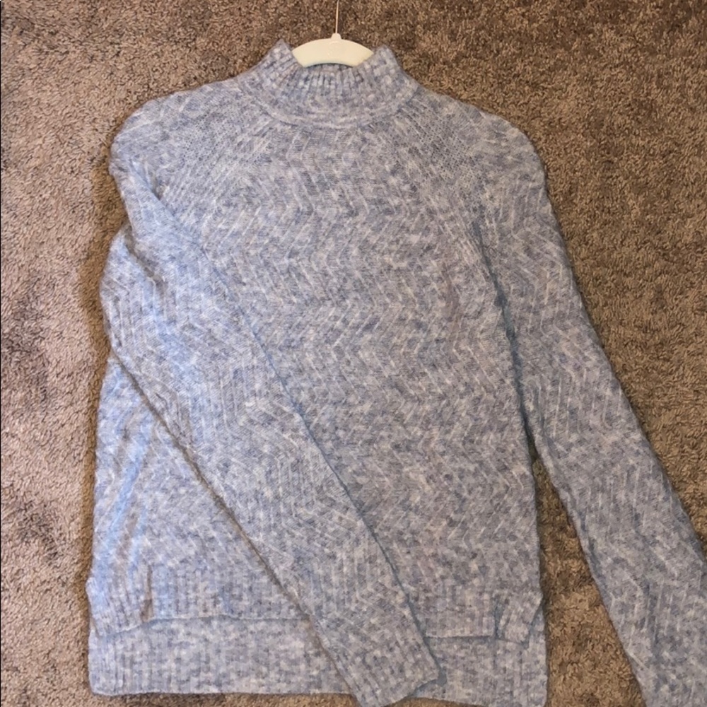 turtleneck sweater.